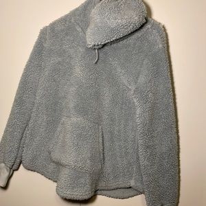 Fuzzy sweatshirt with pocket, mint/light blue color